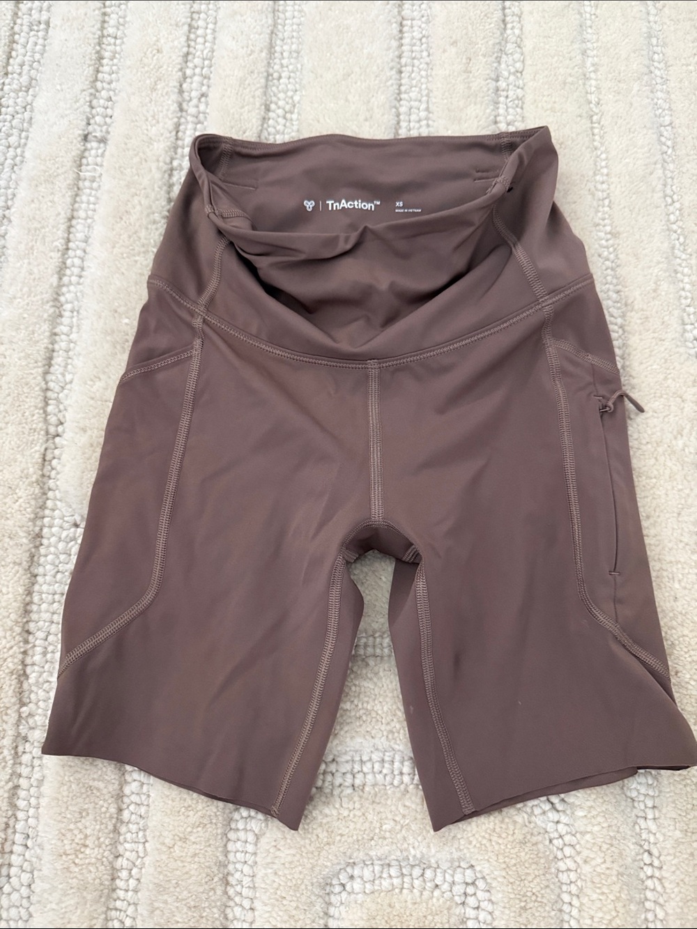 TNA TnAction High-Rise Bike Shorts in Deep Brown